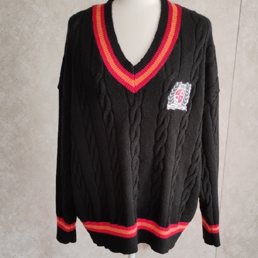 Black Cable Knit Sweater with Red and Orange Trim